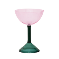 pink coupe cocktail glass with green stem by Urban Nature Culture