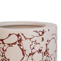top view showing smooth ceramic finish and marbled pattern of Fluido lamp

