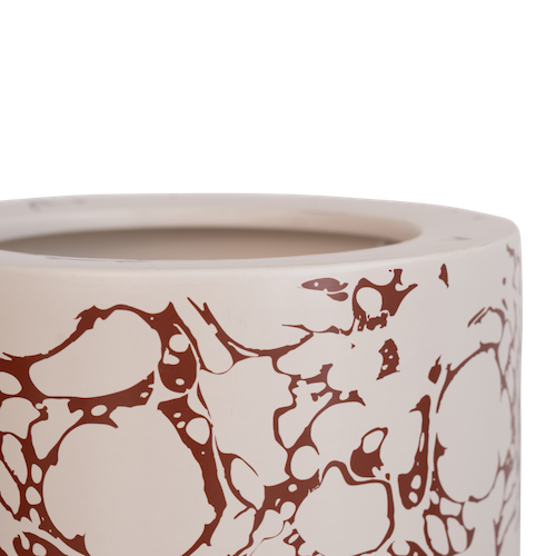 top view showing smooth ceramic finish and marbled pattern of Fluido lamp
