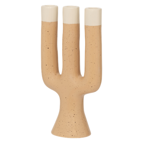 side view of sculptural Nox candle holder in soft natural tones