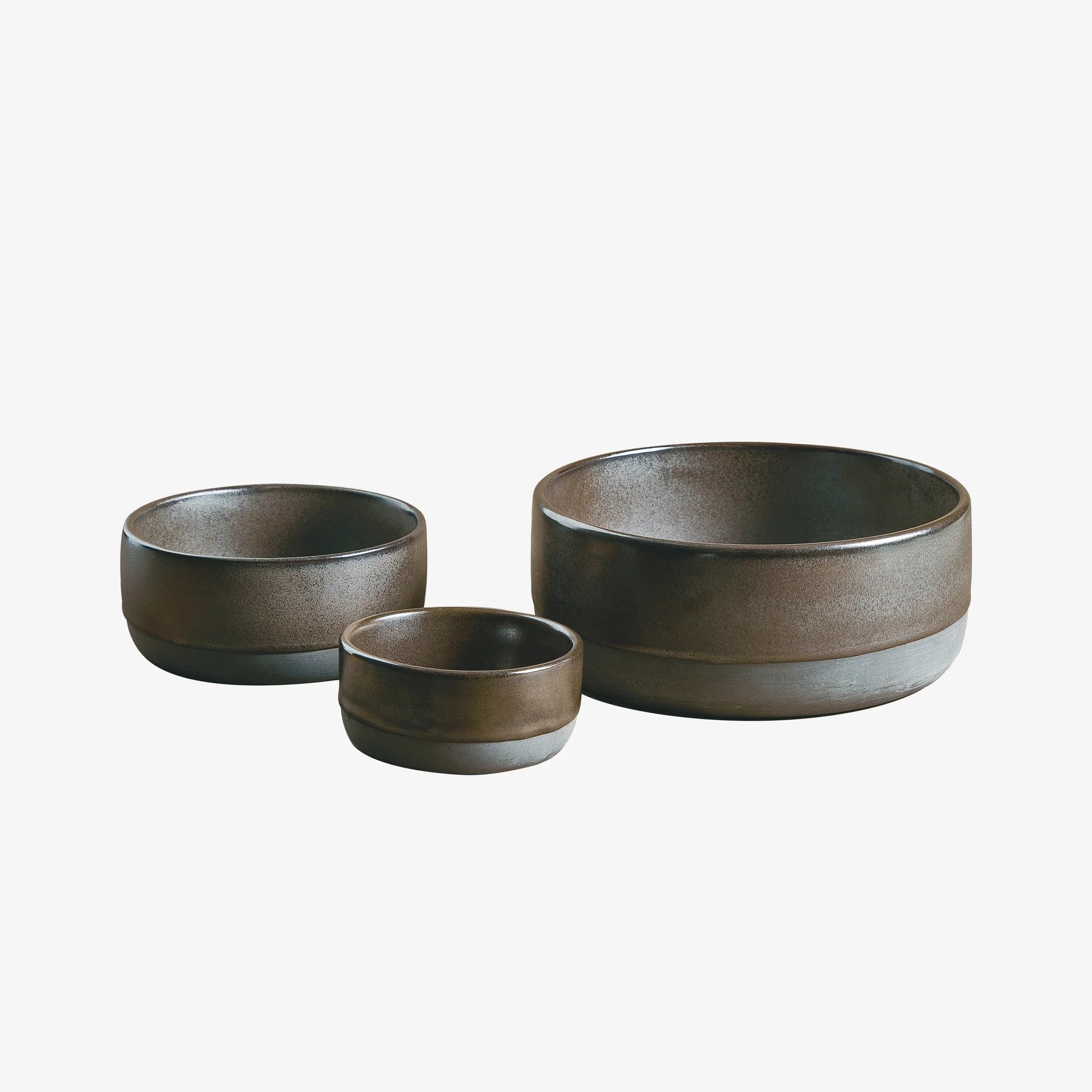 raw metallic brown bowl set by aida showing four handmade stoneware bowls
