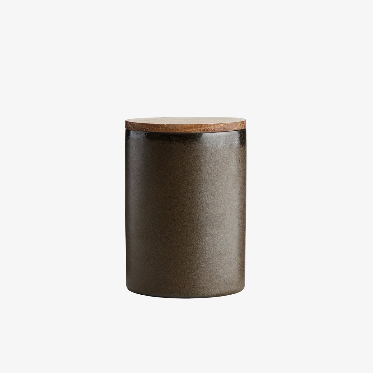 Handmade metallic brown canister adding warmth to open kitchen shelving