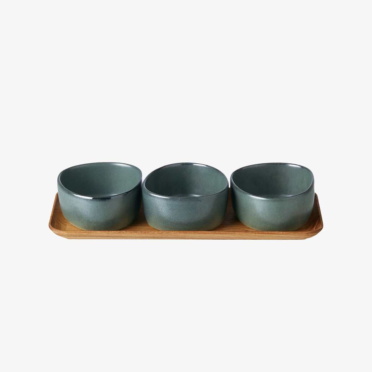 three northern green organic bowls on teak wooden tray by aida cut-out