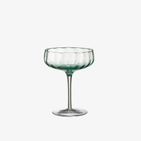 Elegant green coupe glass with wavy textured bowl