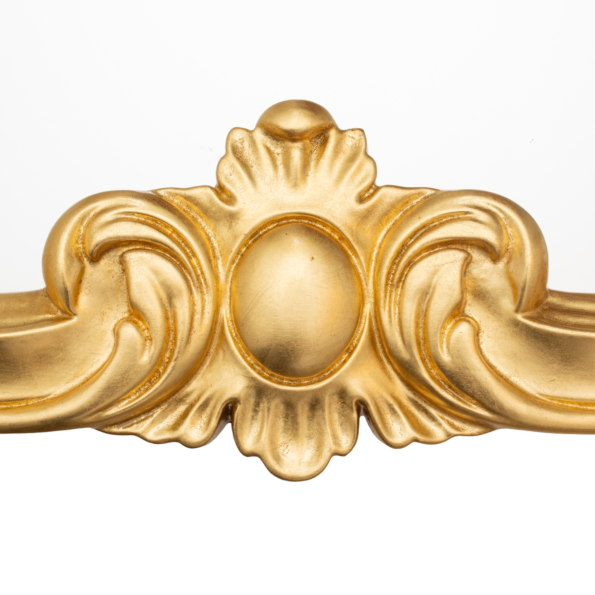 Close-up of the gold crest at the base of the Seletti Tetris Mirror 2.0 frame