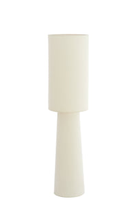 White ceramic table lamp on a white background