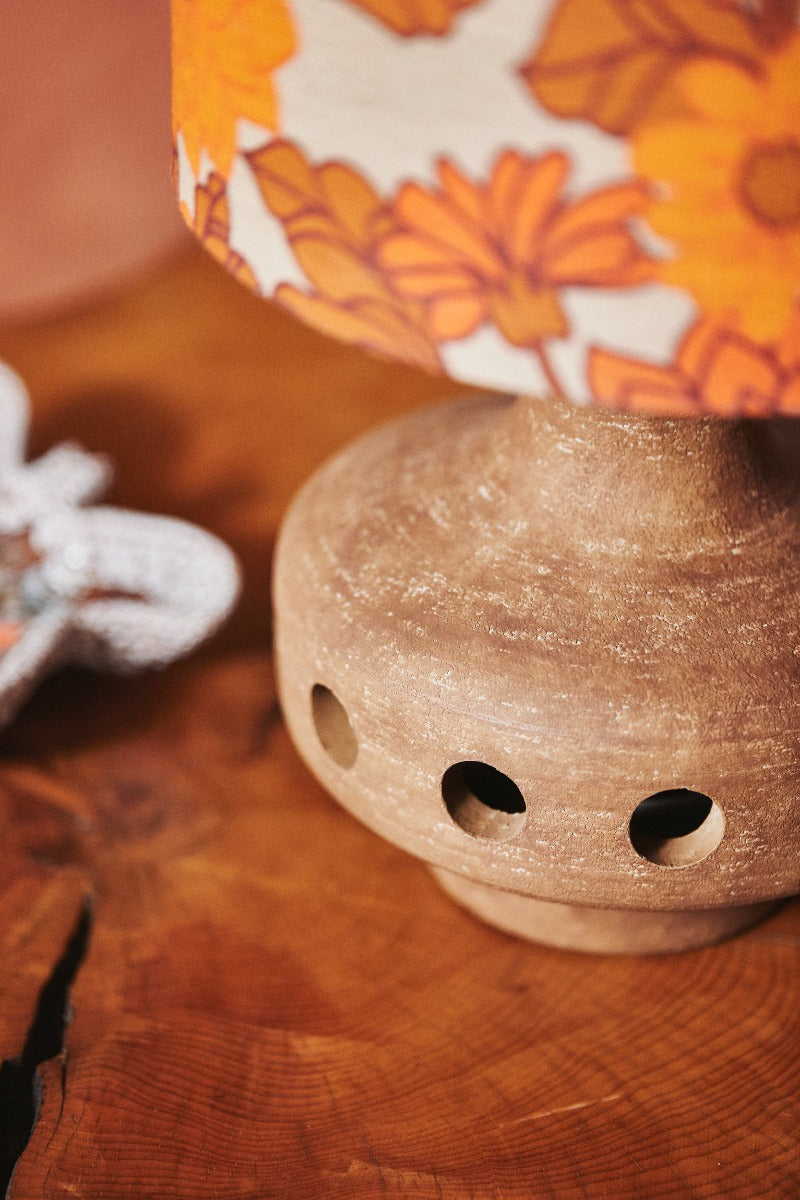 close up of mud terracotta HKLIVING lamp base showing raw tactile textured finish