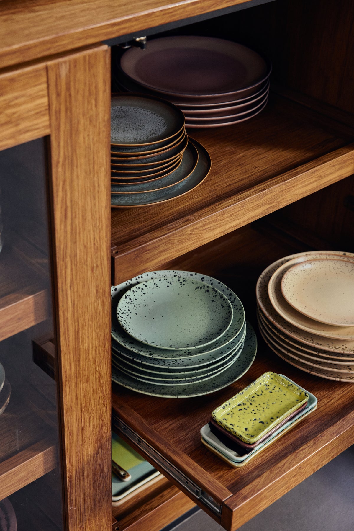 HKLIVING 70s ceramics plates stacked in a wooden cabinet