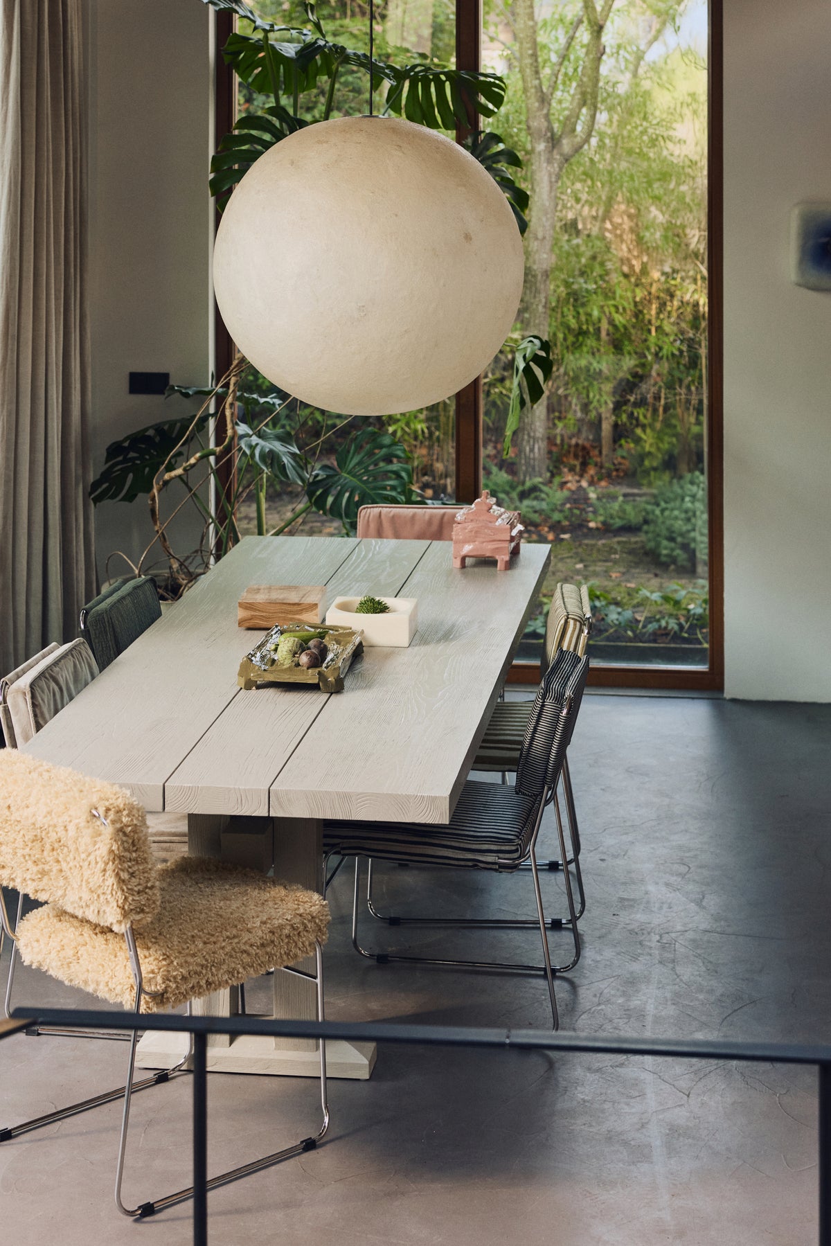 HKLIVING Pop Cube Large in Cream styled in a dining room setting beneath a sculptural pendant light