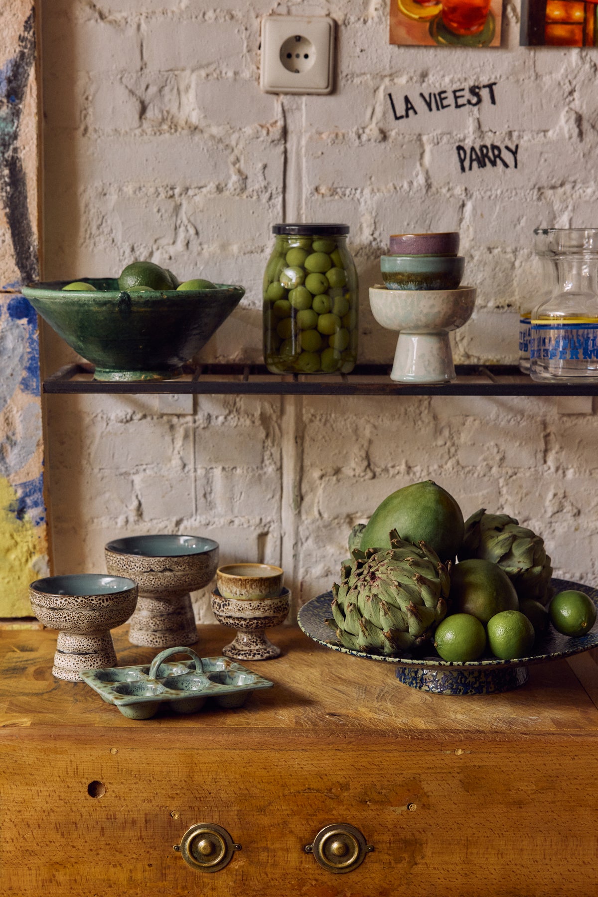 70s Ceramics Egg Tray in Minty displayed on open shelving alongside speckled bowls and other 70s Ceramics pieces