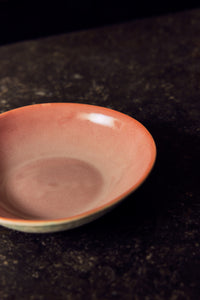 Close-up of the 70s ceramics curry bowl in Lotus, showing the dusky pink glazed interior