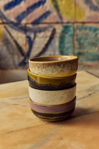 70s Ceramics tapas bowls in Sweet styled in close stacked pairs against a colourful painted tile backdrop