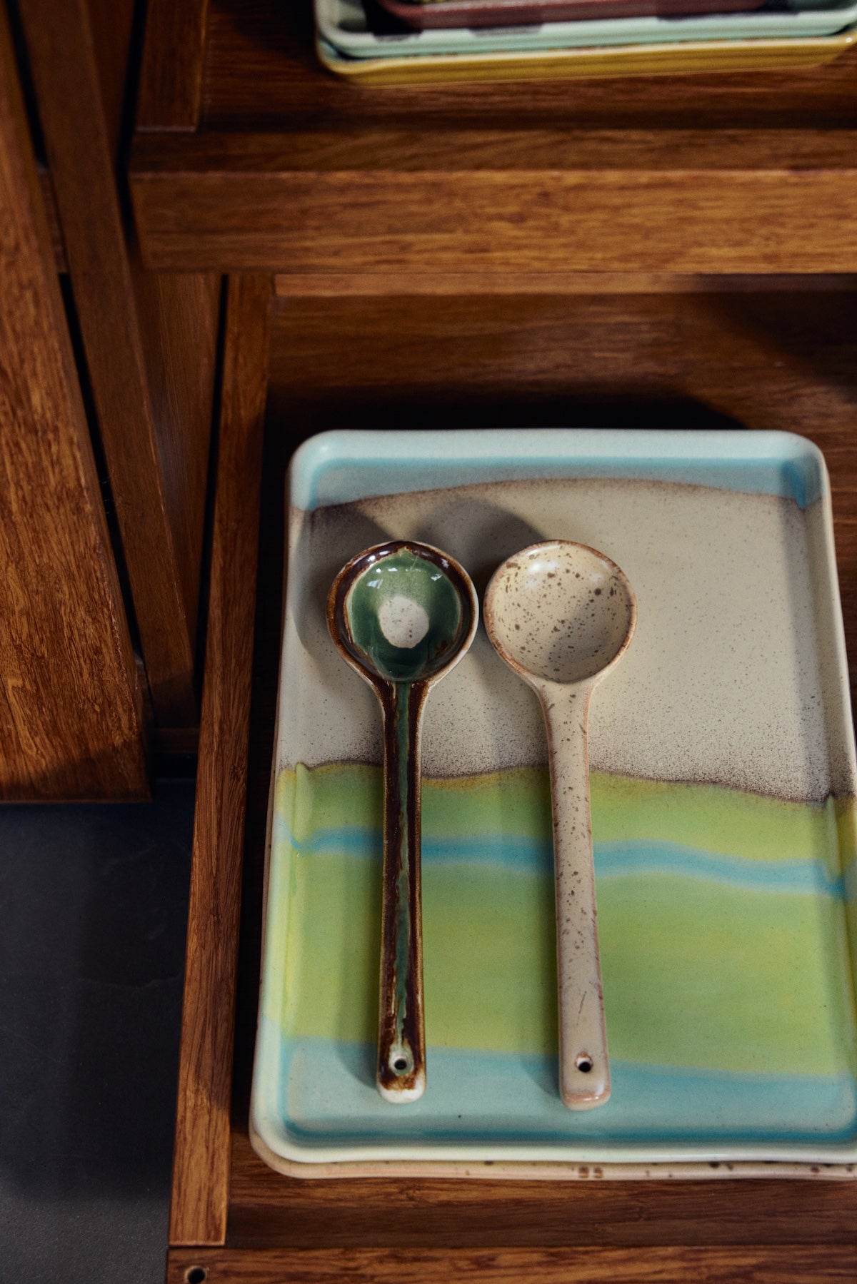 HKLIVING glint large stoneware tray styled with ceramic spoons showing colourful glaze