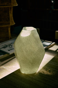 Backlit Nienke Sikkema for HKLIVING jade gemstone vase showing frosted sage green glass texture