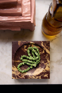 Burgundy marble cube, campaign shot