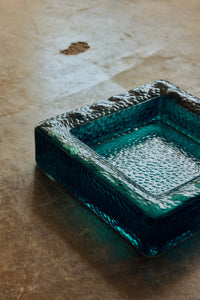 Teal sculptural square bowl, campaign shot