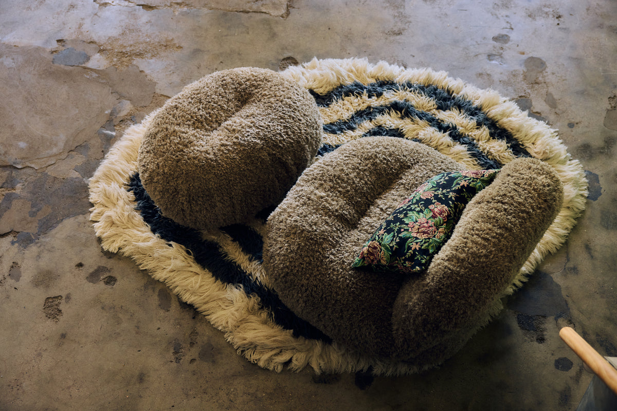 Woven Evening Bloom cushion, campaign shot