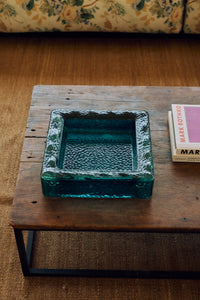 Teal sculptural square bowl, campaign shot