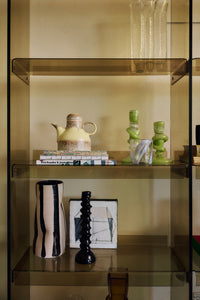 Lifestyle shot of the tall Olive Green Acrylic Cabinet by HKLIVING styled in a room setting