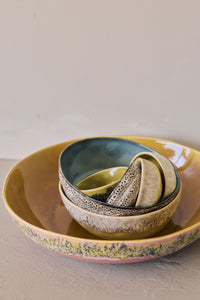 70s Ceramics pitcher, cups and pasta bowls in Brew displayed together on a shelf