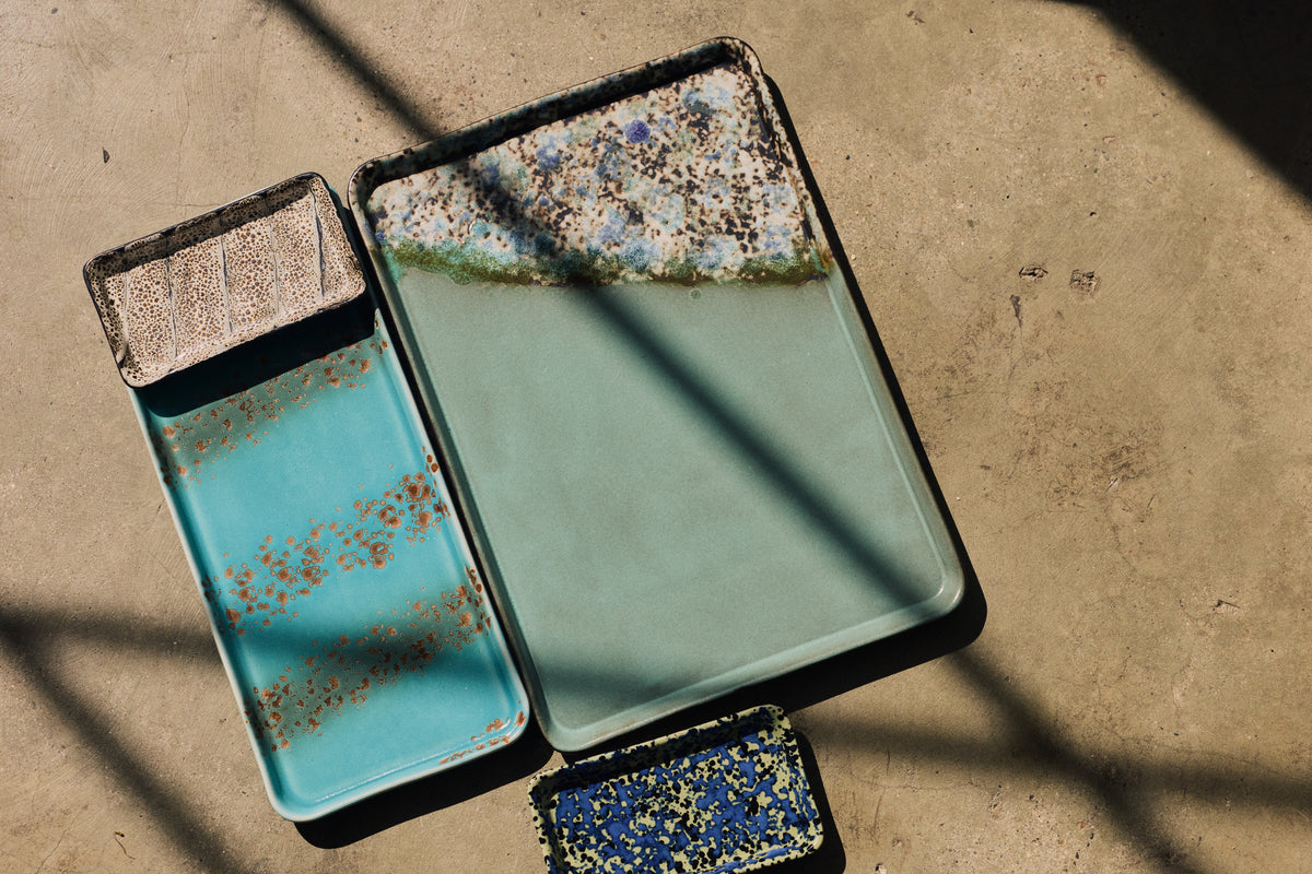 70s Ceramics Cake Tray in Aqua by HKLIVING, styled campaign shot