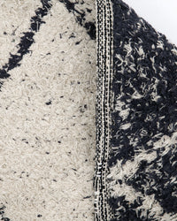 House Doctor Cruz rug close-up showing both sides and woven fringed edge