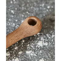 Close-up of the acacia wood handle on Eya rolling pin – natural kitchen utensil

