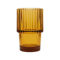 House Doctor Rills amber drinking glass with fluted upper and smooth tapered base, a warm everyday tumbler for stylish table settings