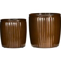 Recycled iron flowerpots with vertical grooves and warm brown glaze
