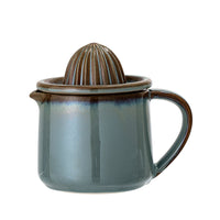 bloomingville pixie citrus juicer in green showing handle and spout