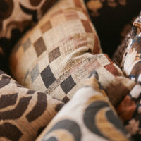 HKLIVING woven cushion styled in living room, brown and cream organic pattern cushion with cosy seating