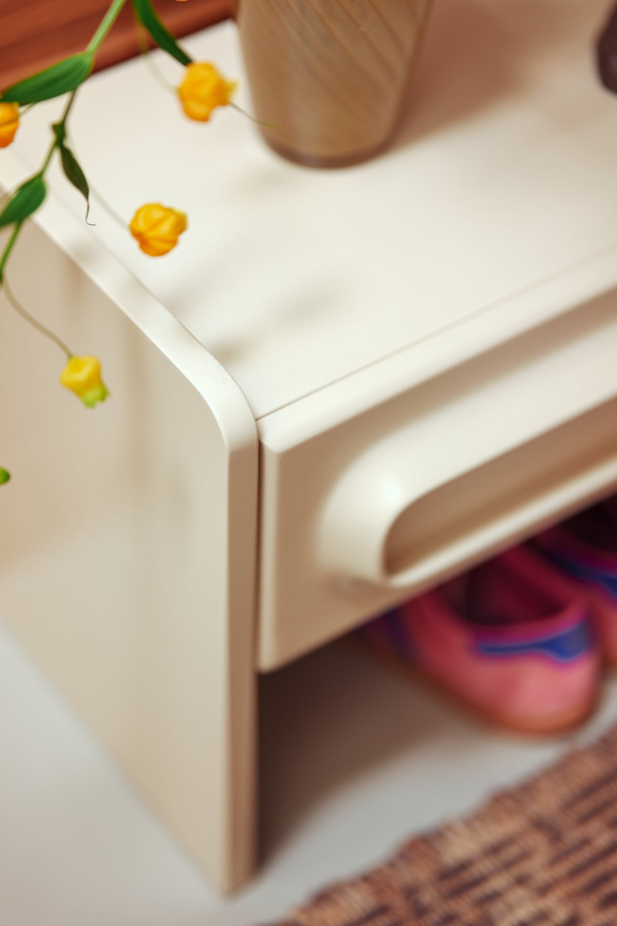 Lifestyle shot of the cream Space Lowboard by HKLIVING styled in a room setting