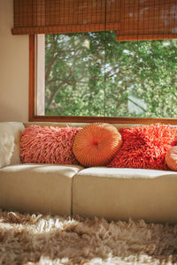 Pink shaggy wool cushion by HKLIVING, 60x40cm rectangular cushion, cosy textured styling on sofa
