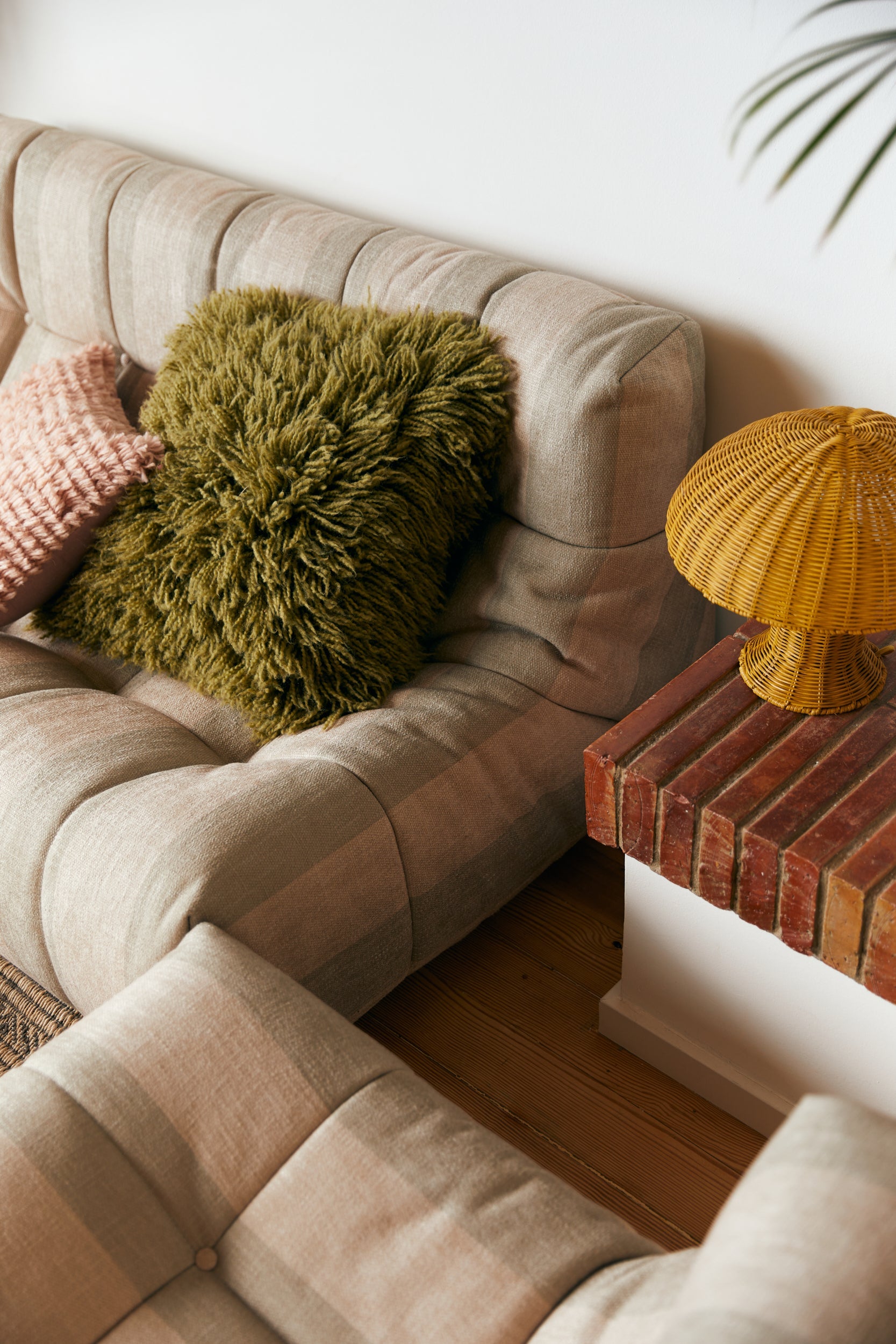 Olive green fluffy wool cushion 50x50cm, square scatter cushion angled view by HKLIVING
