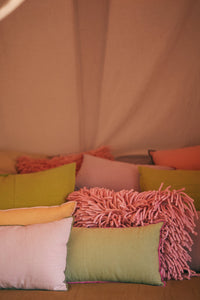 Pink rugged wool cushion by HKLIVING, styled in living room with soft pink texture detail
