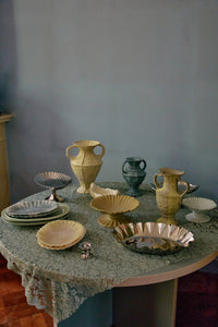 Table set with ceramic jugs, plates and the Medium HKLIVING chrome tray on a soft green tablecloth