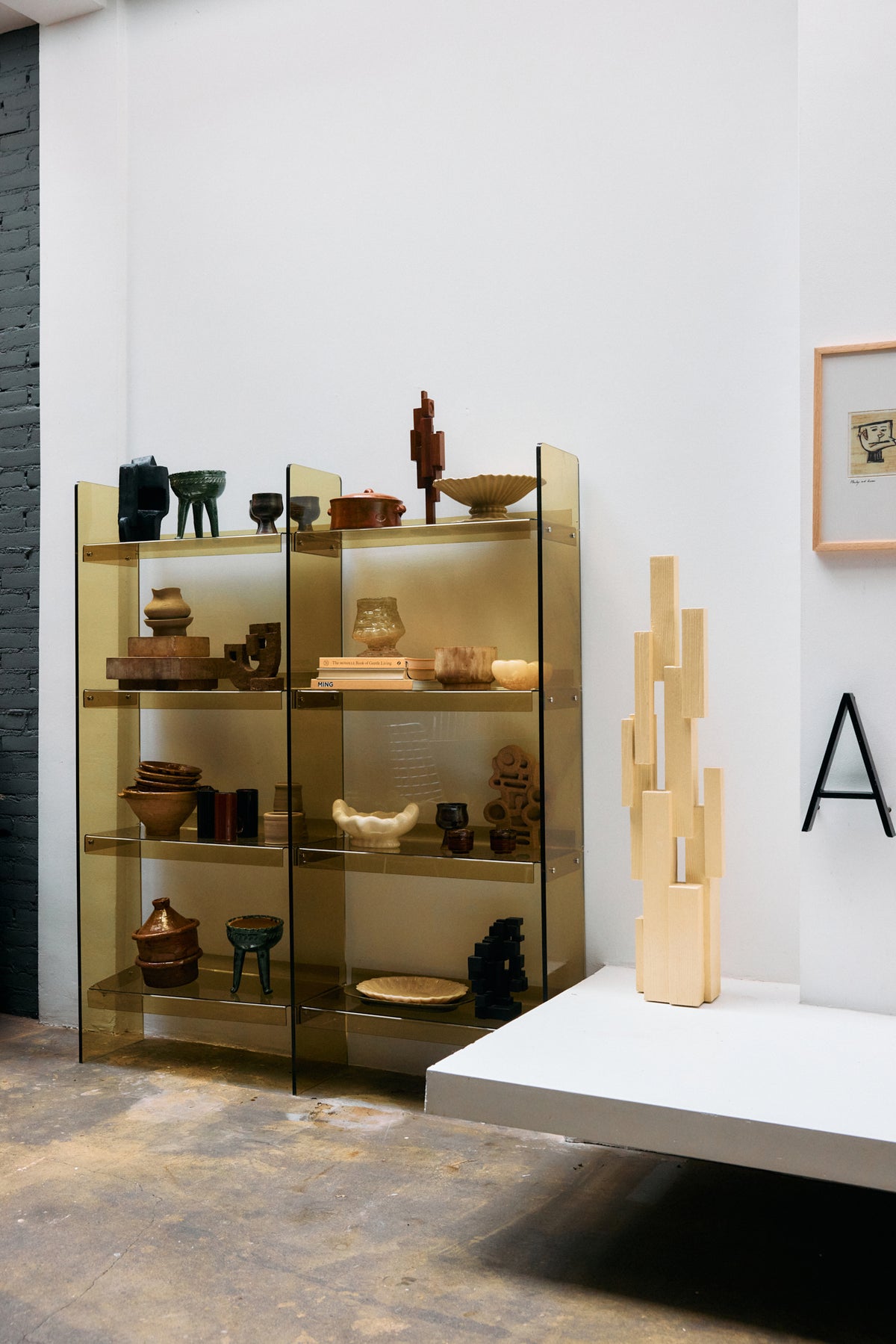 Lifestyle shot of the Olive Green Acrylic Cabinet by HKLIVING in a showroom setting