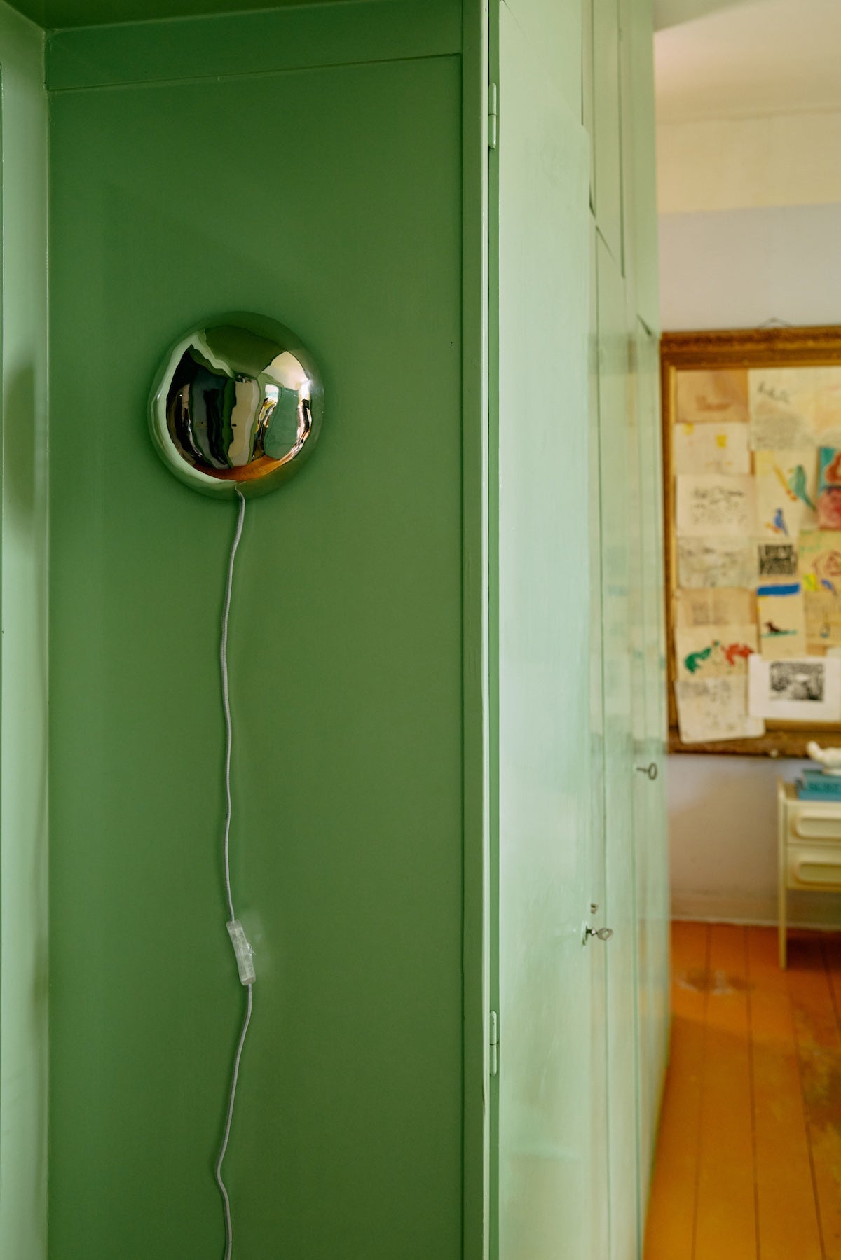 HKLIVING polished chrome orb wall lamp mounted on a green wall beside an open doorway