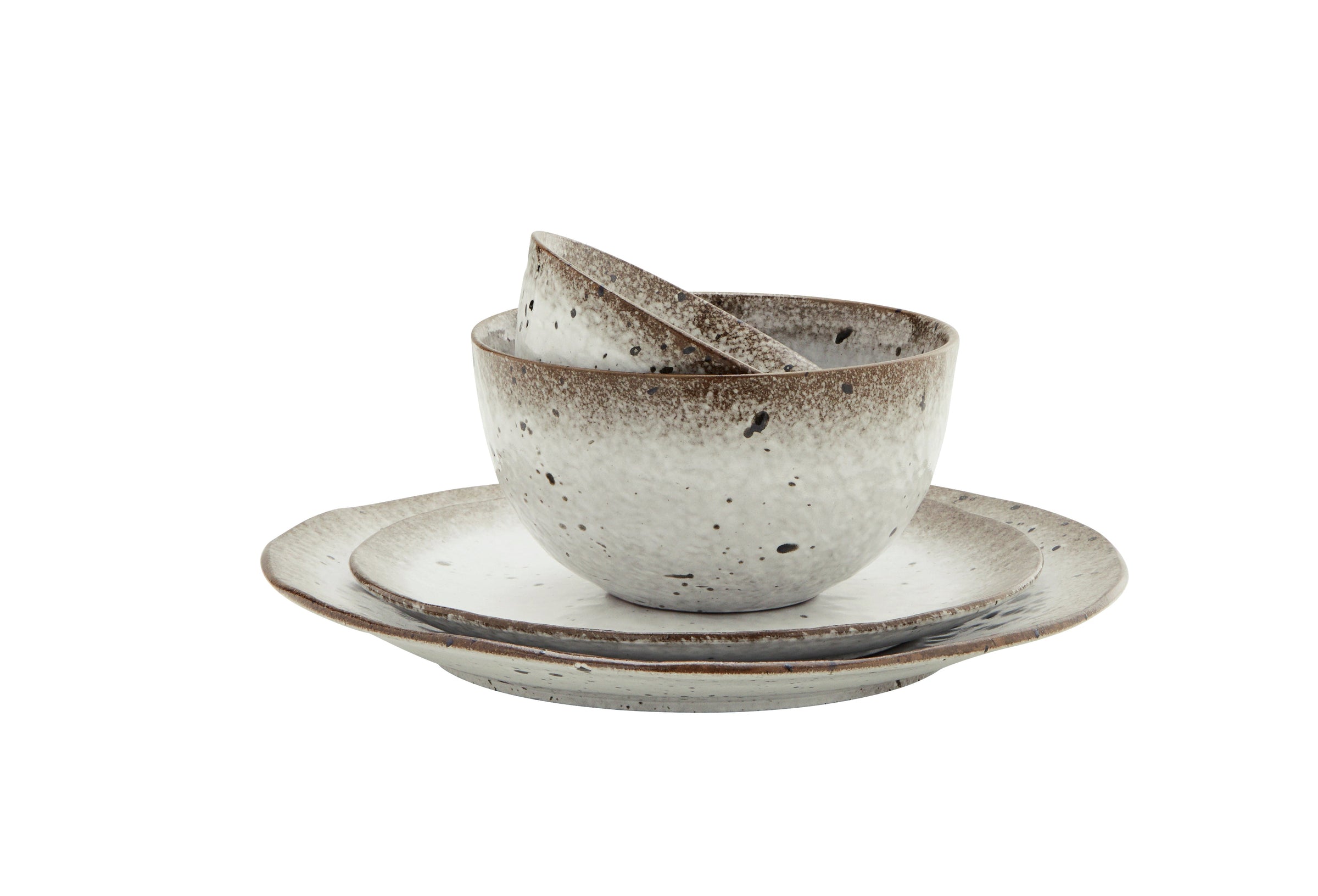 stoneware dinner plate showing reactive glaze and speckled edge detail
