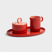 red chiquito sugar pot and milk jug by &k on matching tray for colourful breakfast styling