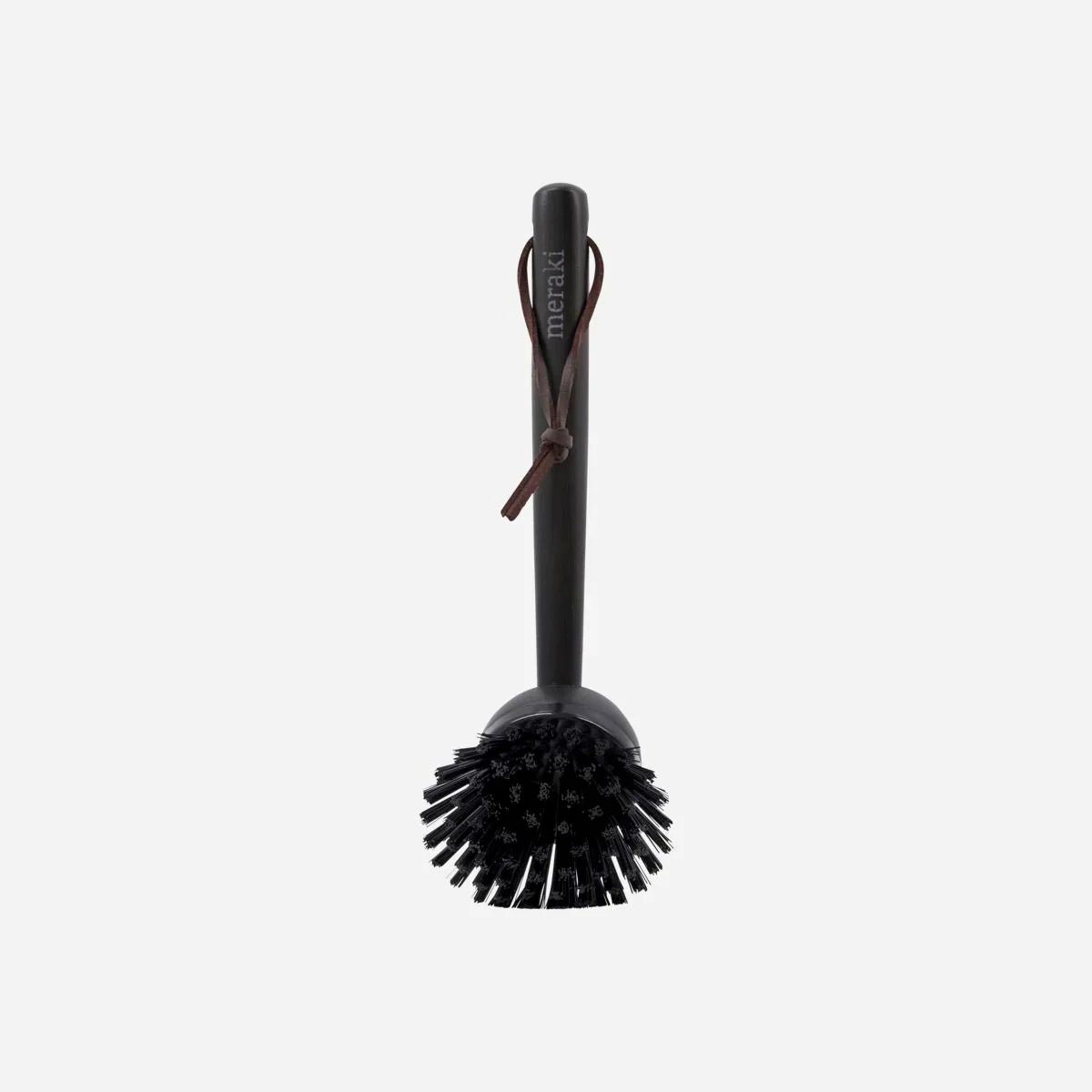 Meraki bamboo dish brush in black with leather hanging strap and replaceable brush head, a stylish sustainable swap for the kitchen sink
