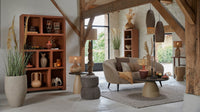 junto matt sand ceramic side table styled in warm neutral living room