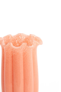 close up of fluted peach glass sedona vase with ruffled rim