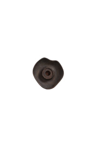 dark brown wooden candle holder with organic shape and central taper candle inset
