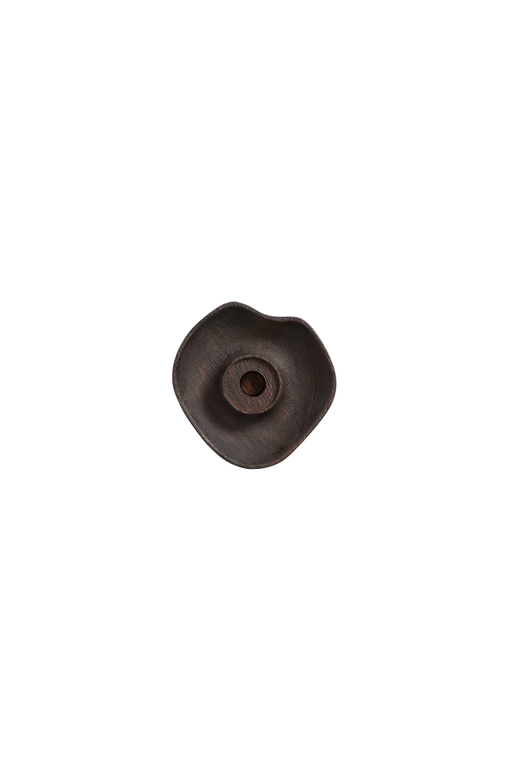 dark brown wooden candle holder with organic shape and central taper candle inset
