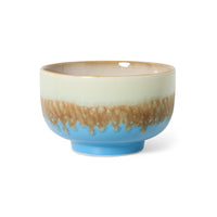 hand-finished stoneware noodle bowl highlighting layered blue glaze
