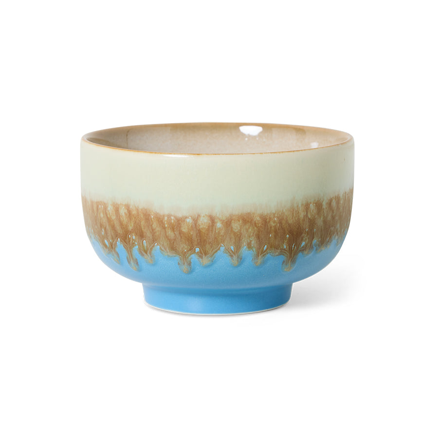 hand-finished stoneware noodle bowl highlighting layered blue glaze
