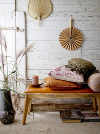 osy neutral bedroom scene with brown striped recycled cotton bolster cushion
