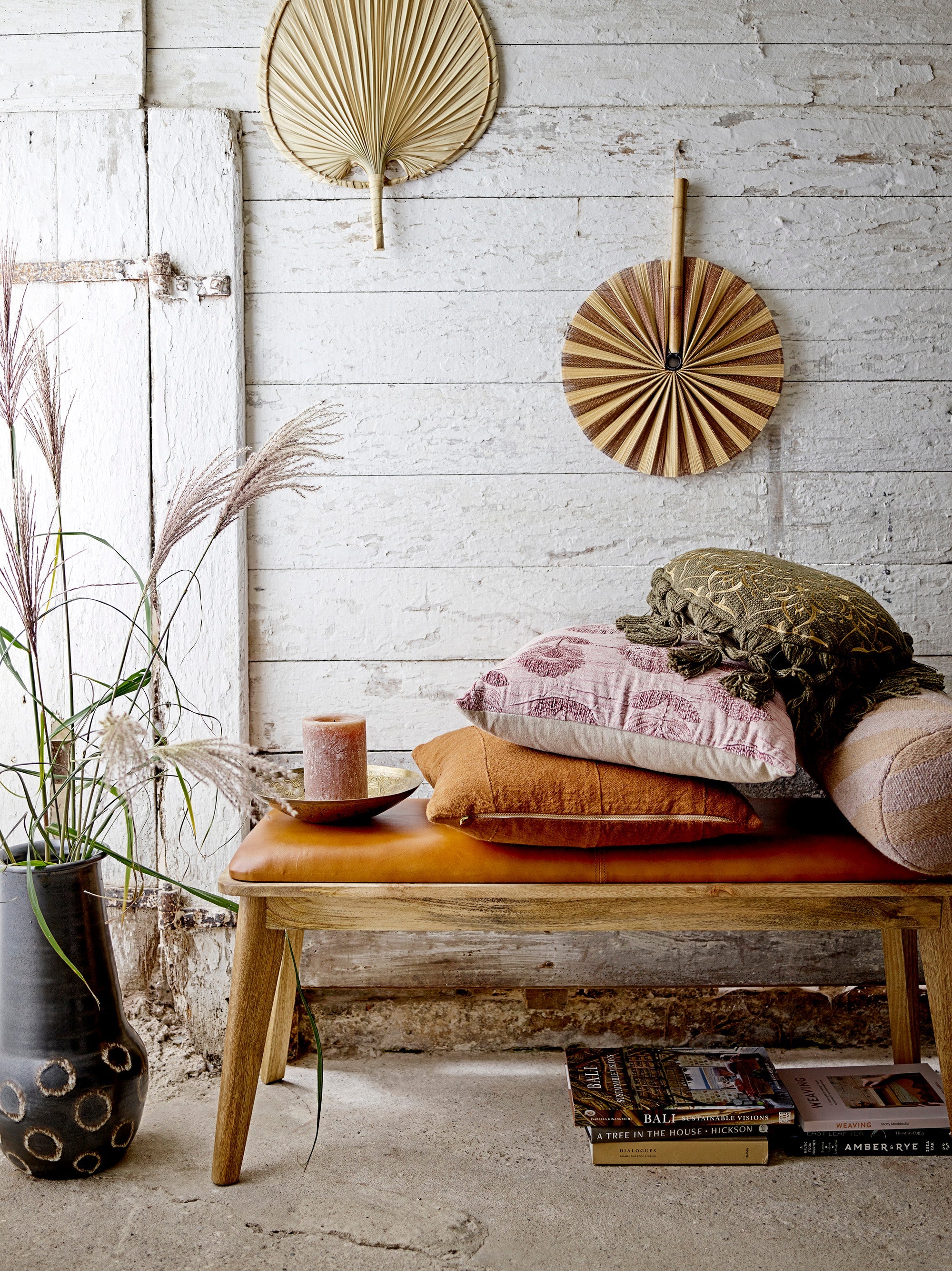 osy neutral bedroom scene with brown striped recycled cotton bolster cushion