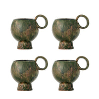 Avonlea cups in green displayed with matching Nordic Simplicity ceramics
